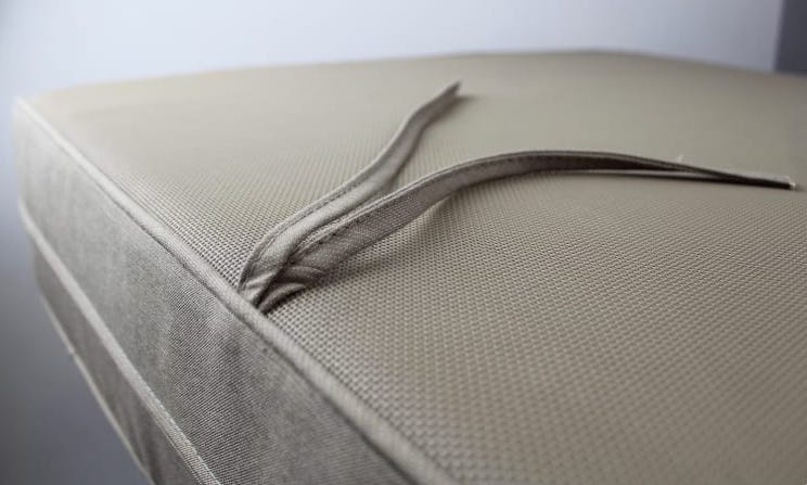 Sunbrella cushion with mesh bottom for each drainage