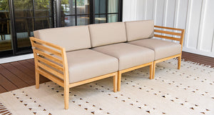 Bali teak outdoor sofa angle- Sunbrella Spectrum Mushroom